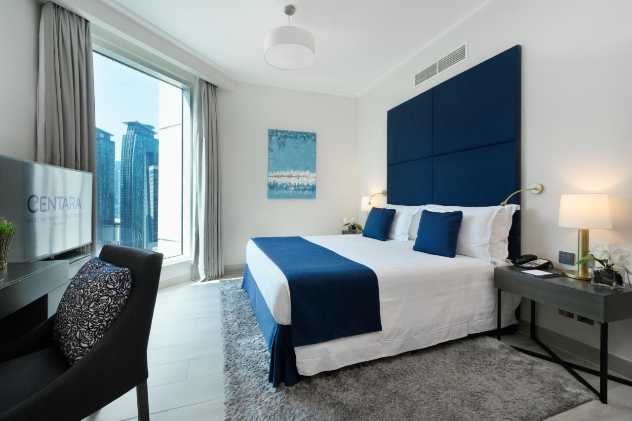 Centara West Bay Hotel&Residences Doha Exterior foto A bedroom at the Address Downtown Hotel